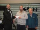 Brad Pierce from Poole Townsend give their prize to Keith Wright with Geoff James from Furness Rotary